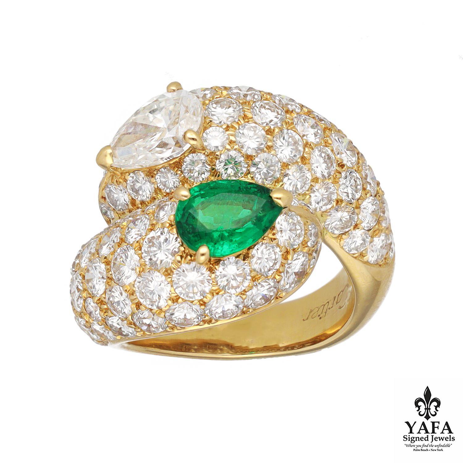 18K Yellow Gold Diamond Pave By-Pass 'You and Me' Ring Containing One Pear-Shaped Diamond and One Pear-Shaped Emerald.
Size - 5
French Assay Marks
Signed - Cartier
