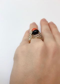 Cartier "Toi & Moi" Ring in diamonds, onyx, corail and yellow gold.