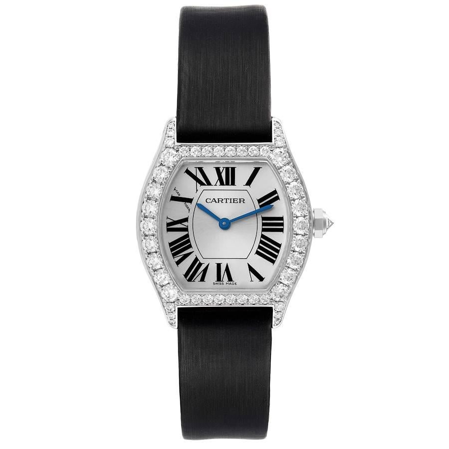 Cartier Tortue 18k White Gold Diamond Black Strap Ladies Watch WA507231. Manual winding movement. 18K white gold case 34.0 x 28.0 mm. Octagonal crown set with the diamond. Diamond lugs. Transparent sapphire crystal caseback. 18K white gold bezel