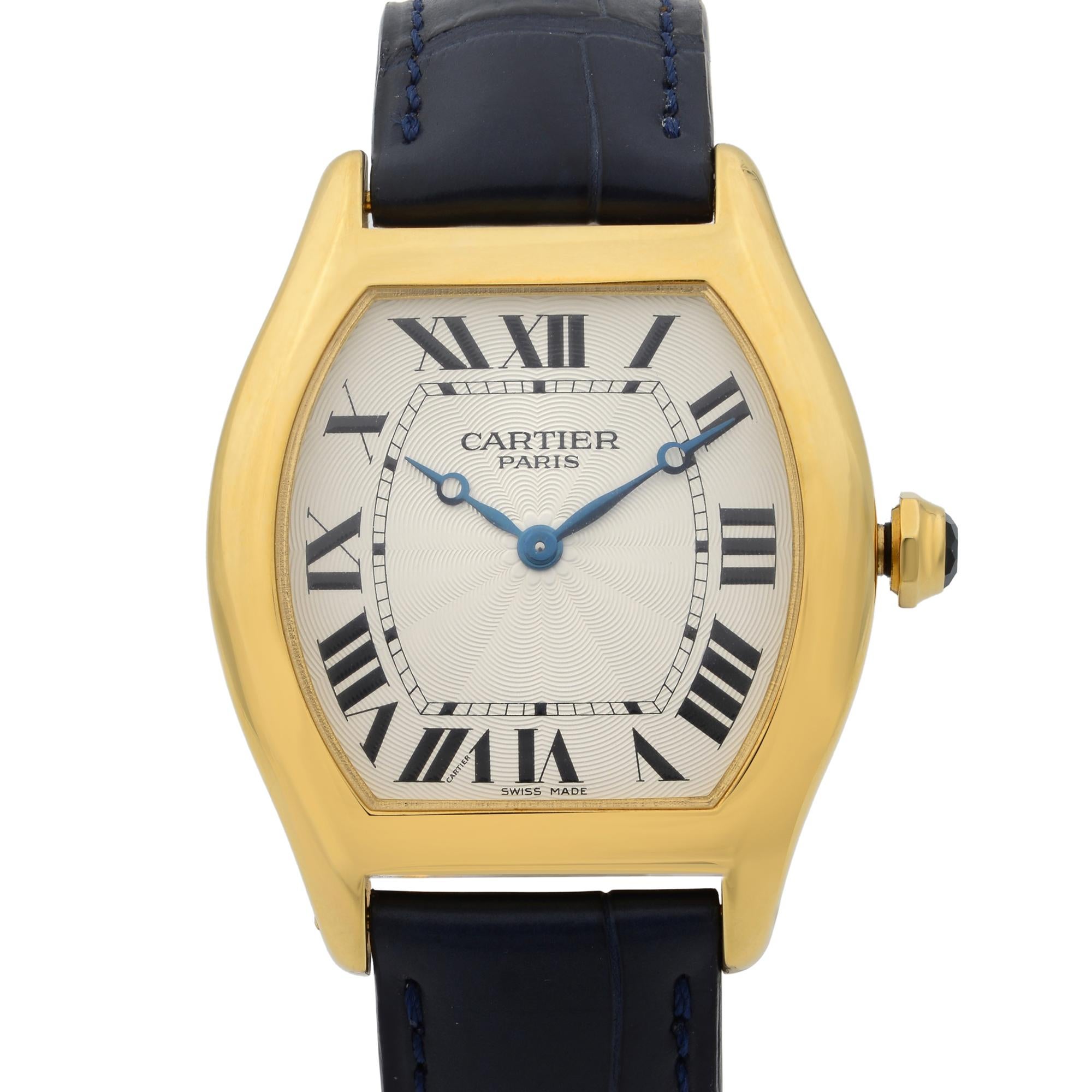 This pre-owned Cartier Tortue 2496C is a beautiful men's timepiece that is powered by mechanical (hand-winding) movement which is cased in a yellow gold case. It has a tonneau shape face, no features dial and has hand roman numerals style markers.