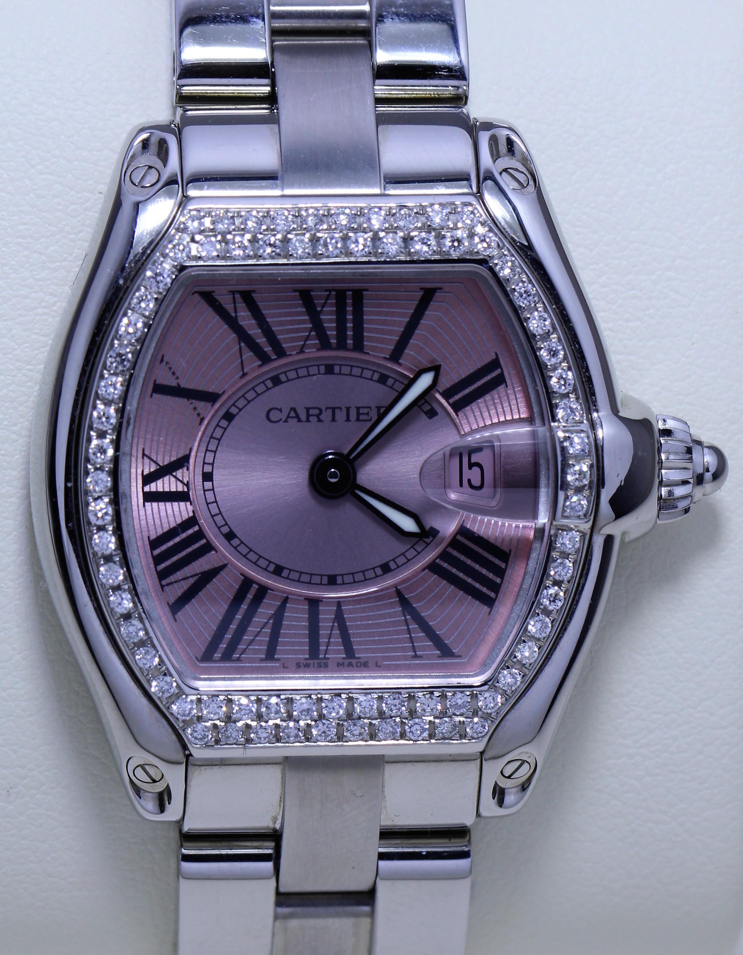 Cartier Diamond Studded Wristwatch
Pink face with date display
Roman numeral hour markers
Diamond studded bezel

