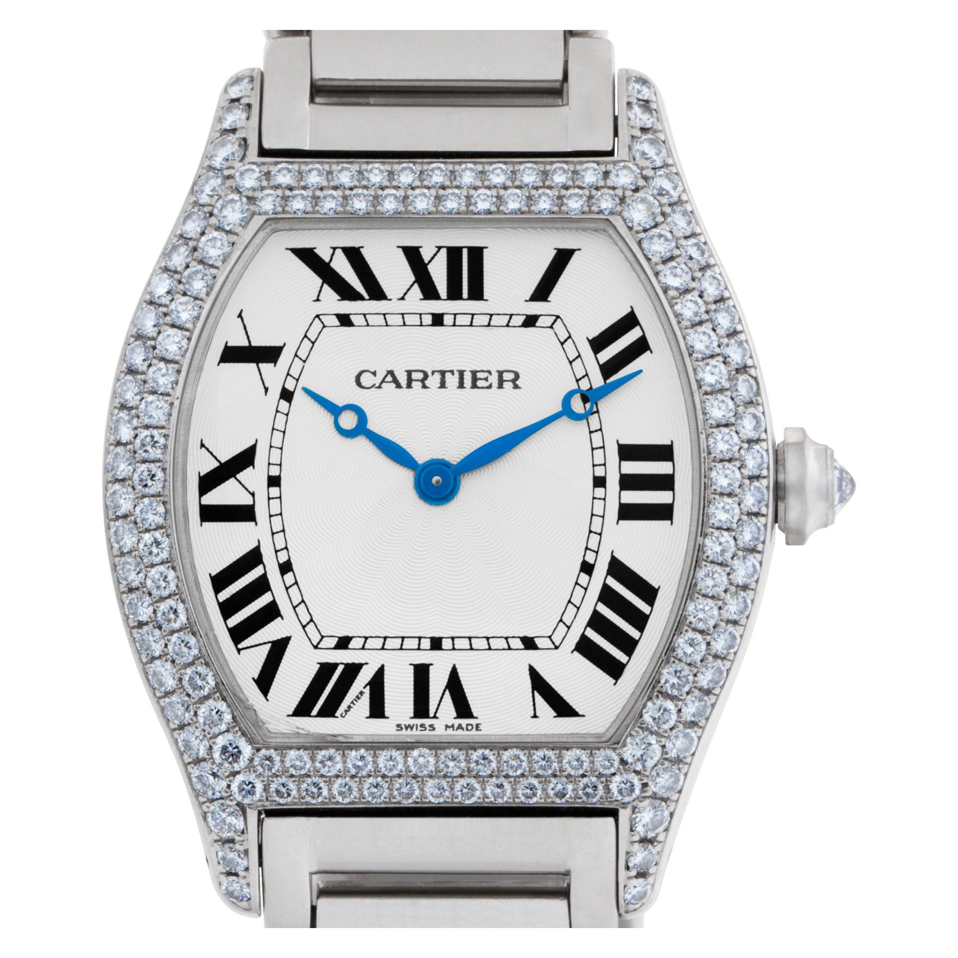 ESTIMATED RETAIL $59,000.00 YOUR PRICE $39,500.00 - 100% AUTHENTIC, FACTORY ORIGINAL - Cartier Tortue with double row diamond bezel in 18k white gold. Manual. 34 mm case size. With box and papers. Ref W518457.  Dress Cartier Tortue W518457 watch is