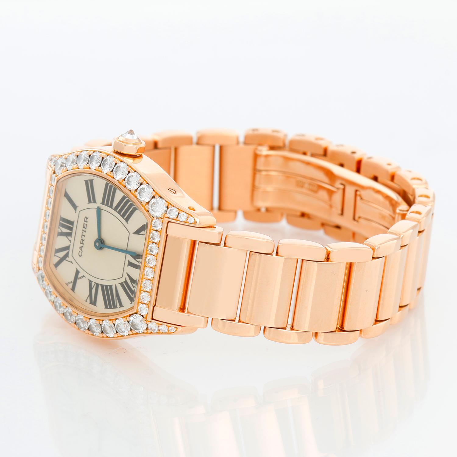 Cartier Tortue Ladies Rose Gold Diamond Watch Ref 2645 - Manual winding. Rose Gold case with diamonds ( 20 mm x 27mm). Silver dial with Roman numerals. 18K Rose Gold bracelet; will fit up to a 6 1/2 inch wrist . Pre-owned with Cartier box and books. 