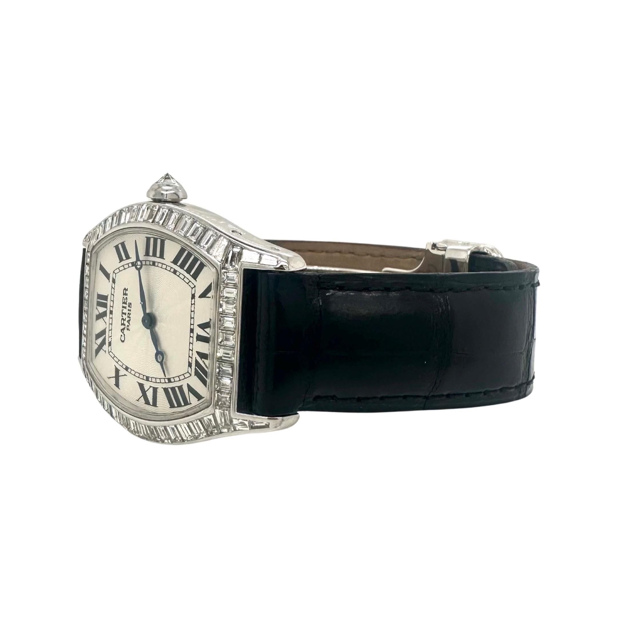 Brand: Cartier​​​​​​​

Model Name: Tortue

Model Number: Y-160

Movement: Automatic

Case Size: 44 mm 

Dial Color:  White

Metal: 18K White Gold

Stones: Baguette Diamonds

Hour Markers: Roman Numerals 

Crystal: Sapphire Crystal

Includes:
