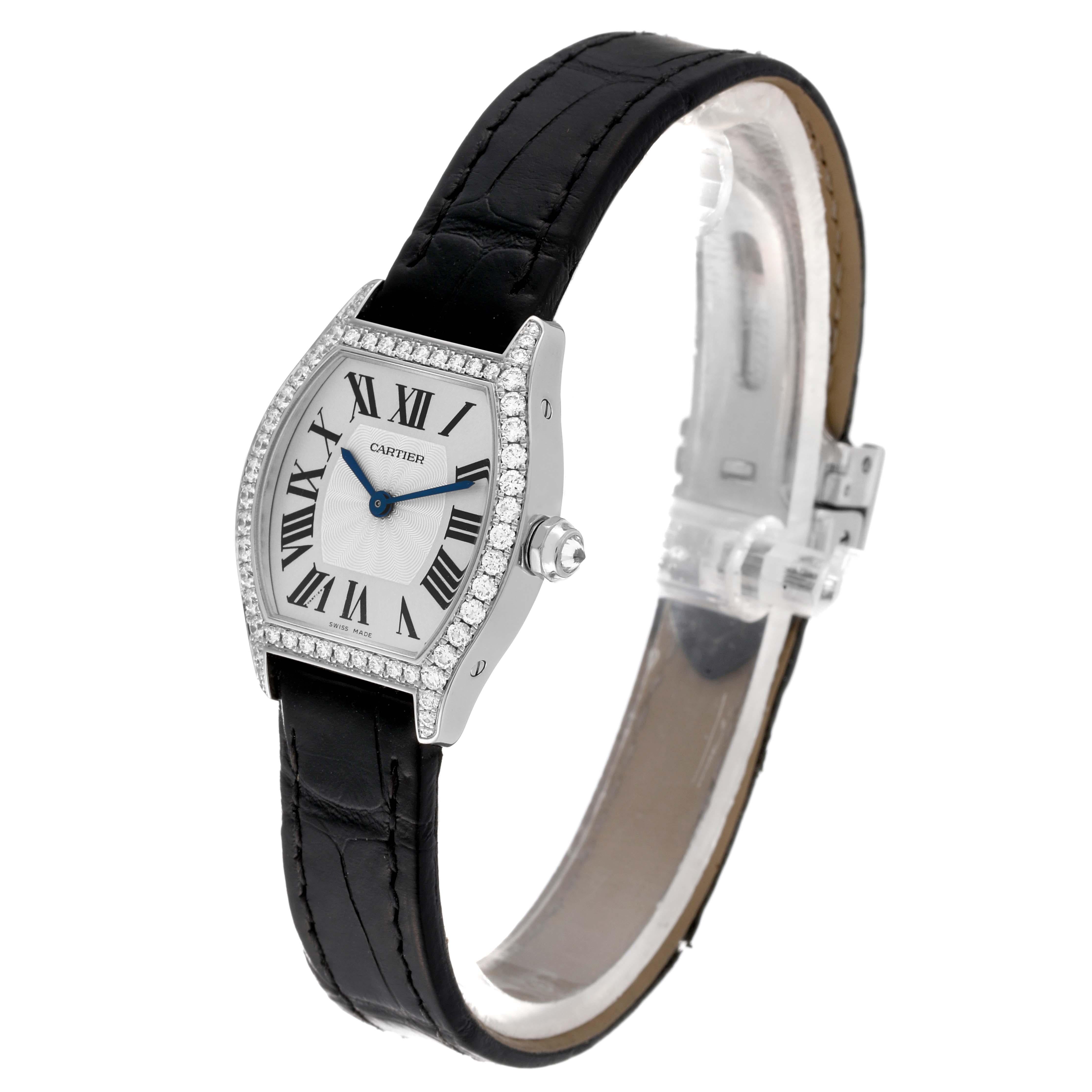 Cartier Tortue White Gold Diamond Ladies Watch WA501007 Box Card. Manual winding movement. 18K white gold case 24.0 x 30.0 mm. Original Cartier factory diamond lugs. Octagonal crown set with an original Cartier factory diamond. 18K white gold bezel