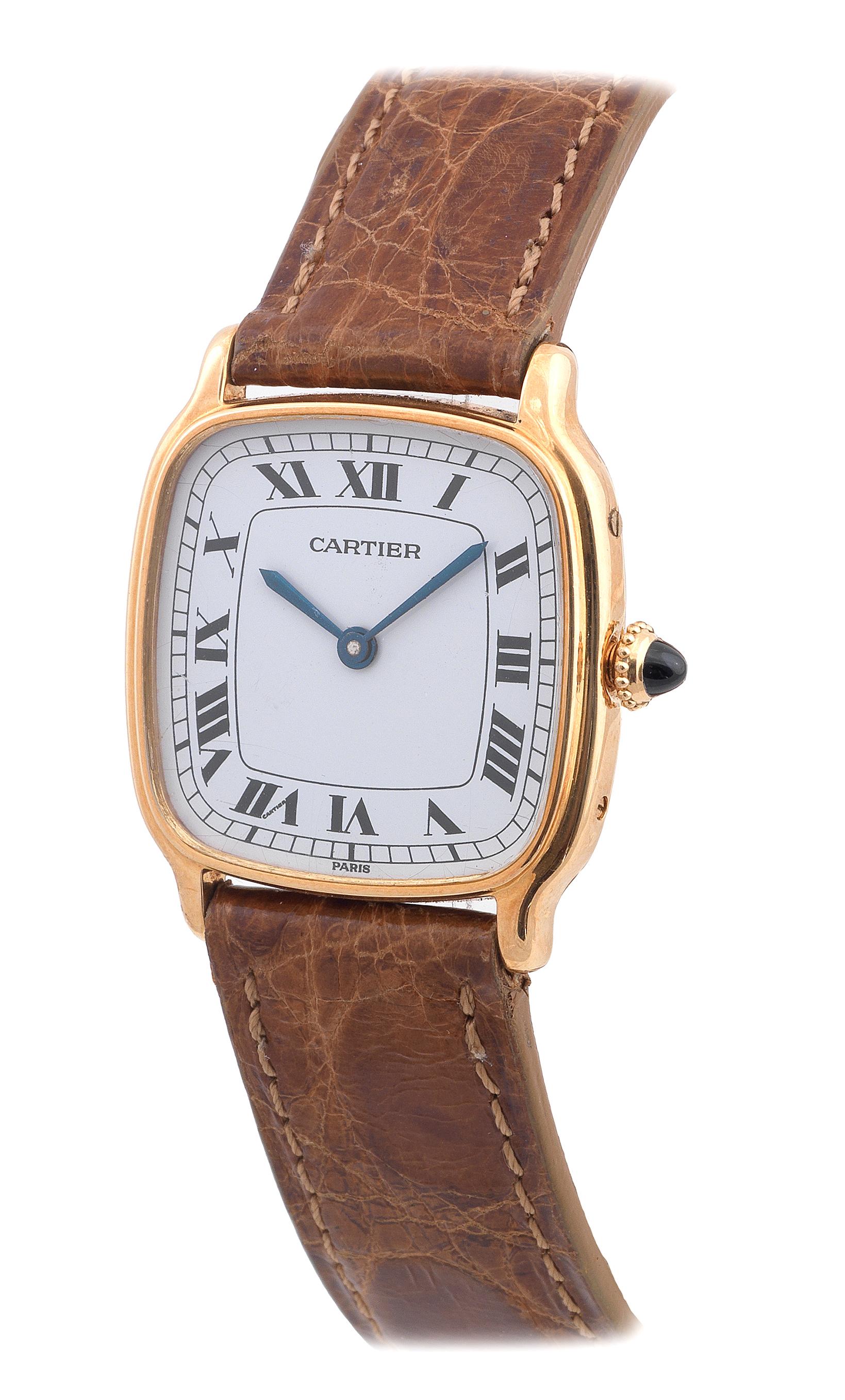 No. 107150442. Made in the 1990's. Fine, tonneau-shaped, 18K yellow gold wristwatch.
Case two-body, solid, polished, screws on the band to secure the case back, cabochon sapphire-set winding crown, sapphire crystal. Dial white with painted radial
