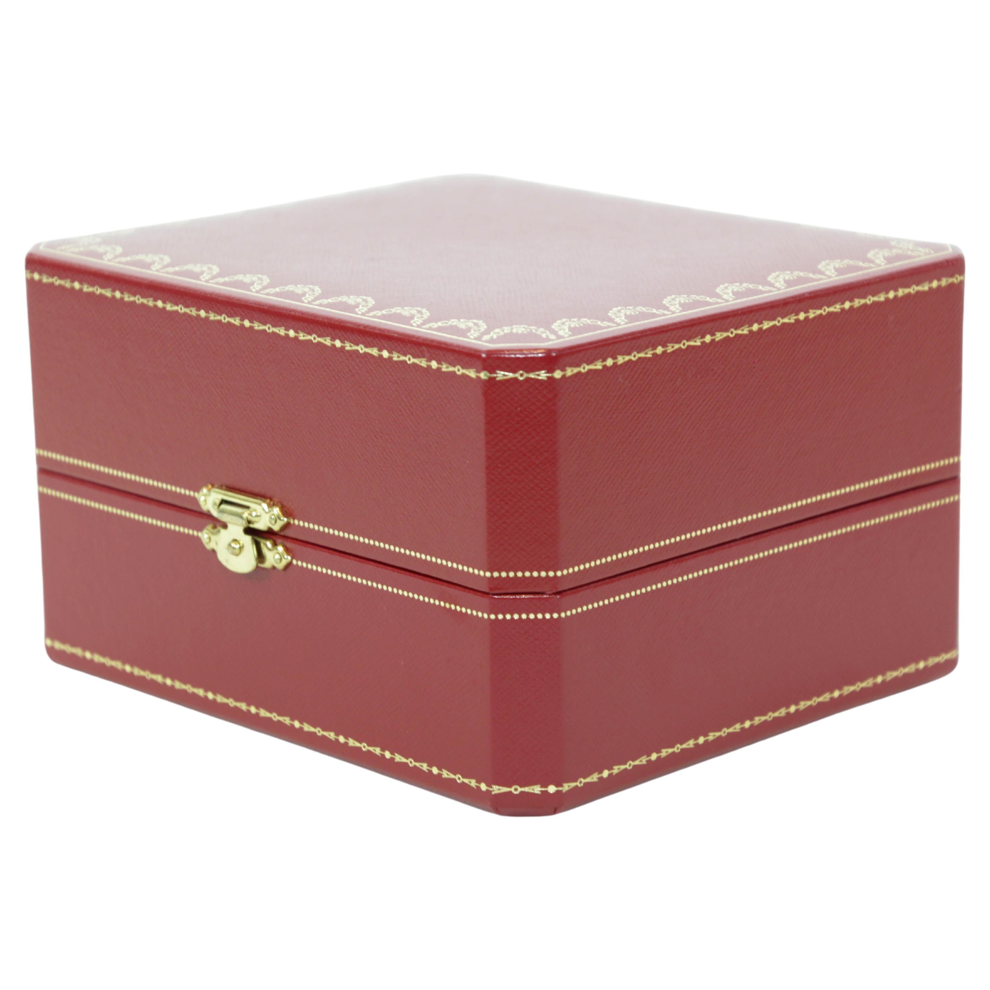 Cartier Red Leather Gilt Embossed Storage travel Watch Box.
Cartier watch and jewelry presentation box.
Elegant wristwatch case.
Cartier Paris red leather and gold travel watch storage box.
White lining great to store your Cartier Watch.
Made in