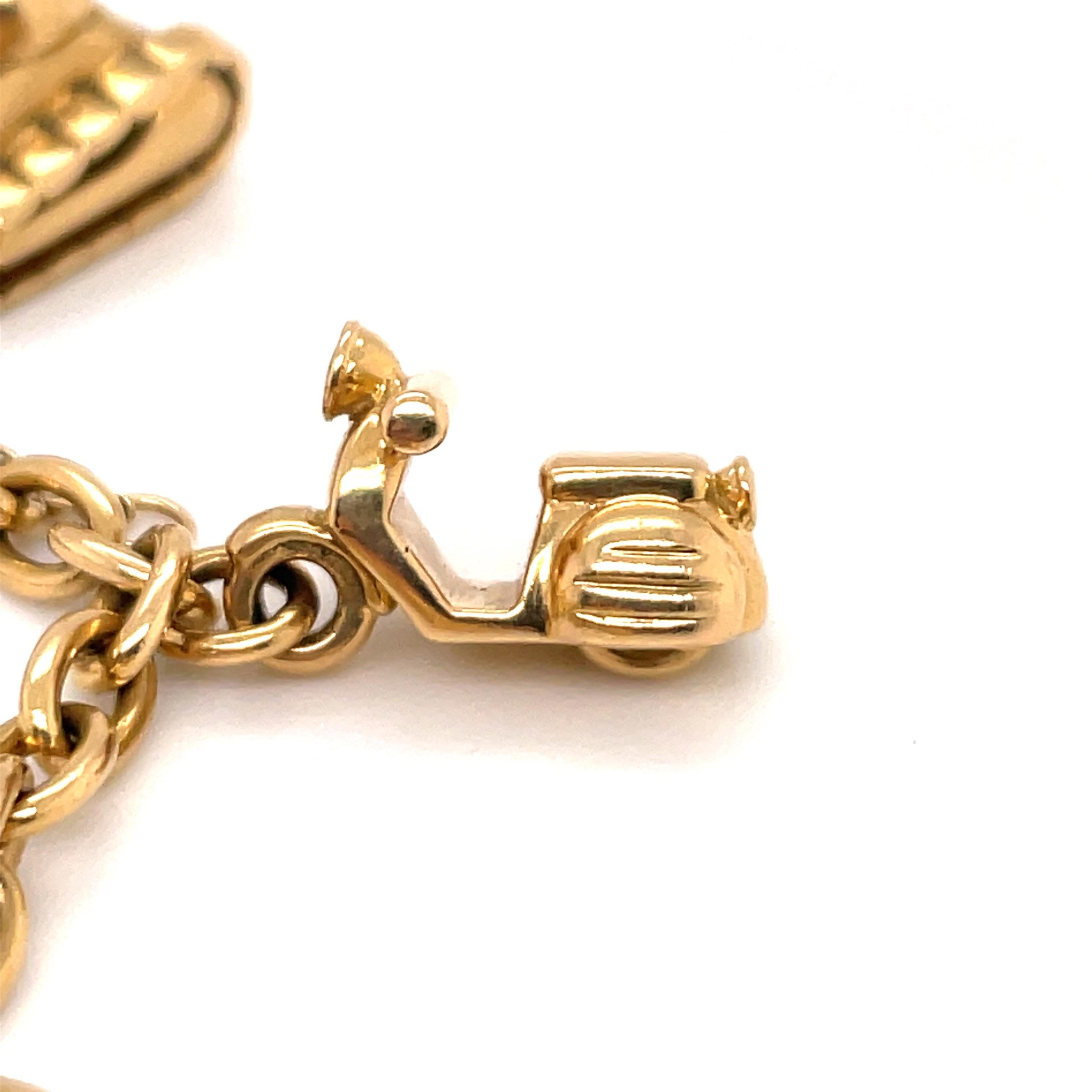 Cartier Bracelet à maillons de voyage à breloques en or jaune 18 carats 42 grammes Pour femmes en vente