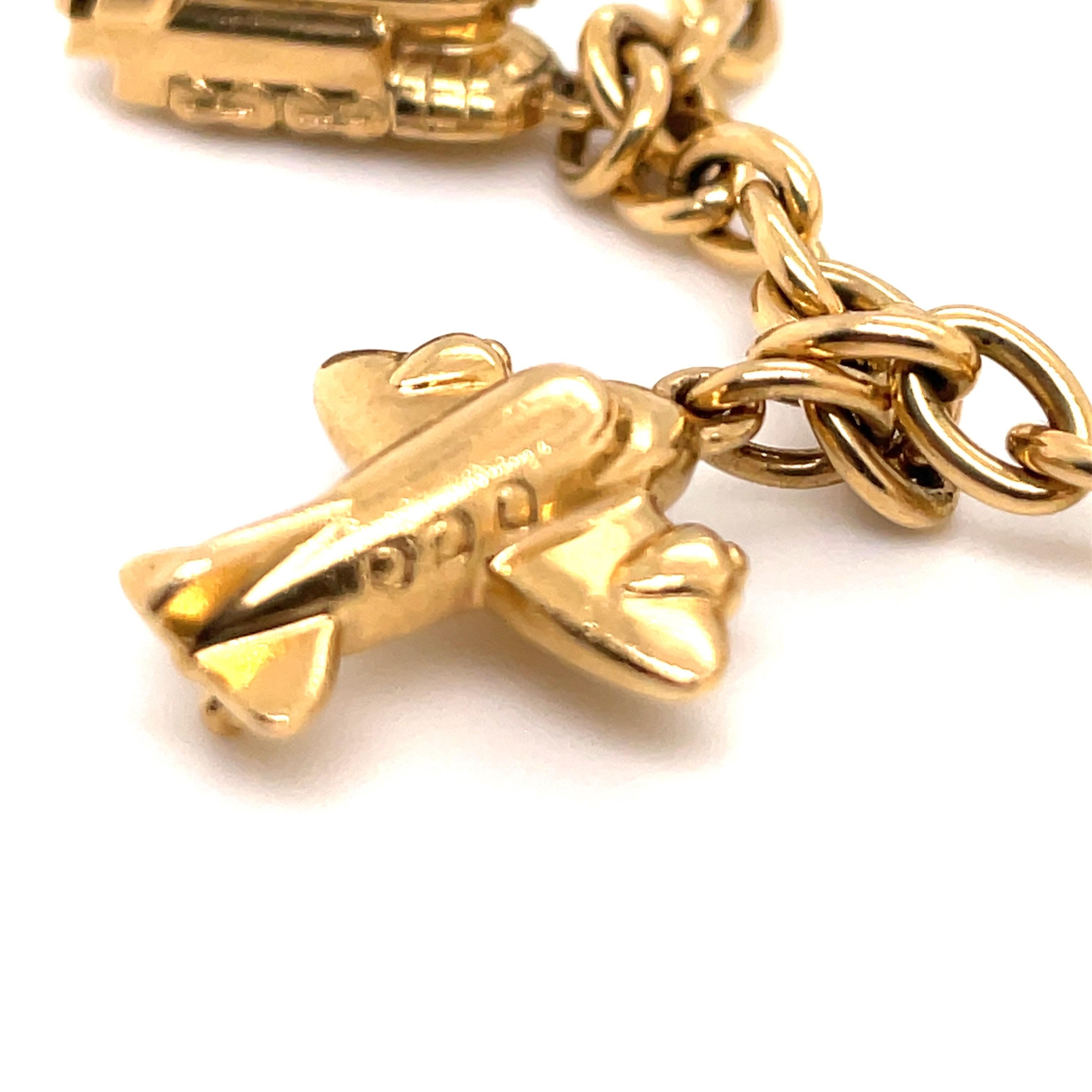 Cartier Bracelet à maillons de voyage à breloques en or jaune 18 carats 42 grammes en vente 1
