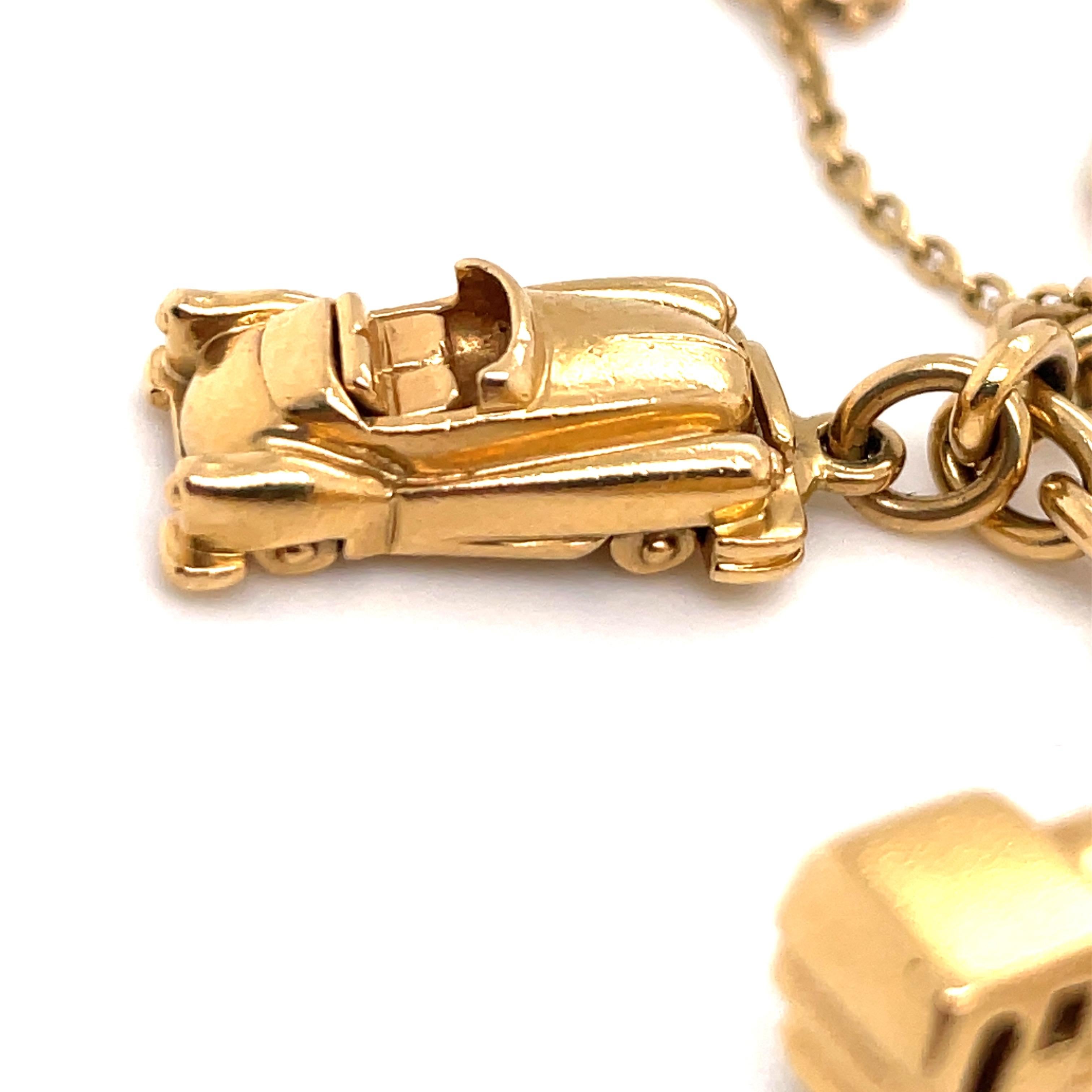 Women's Cartier Traveling Charm Link Bracelet 18 Karat Yellow Gold 42 Grams For Sale