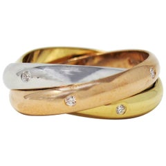 Cartier Tri Color 18 Karat Gold and .19 Carat Total Diamond Trinity Band Ring