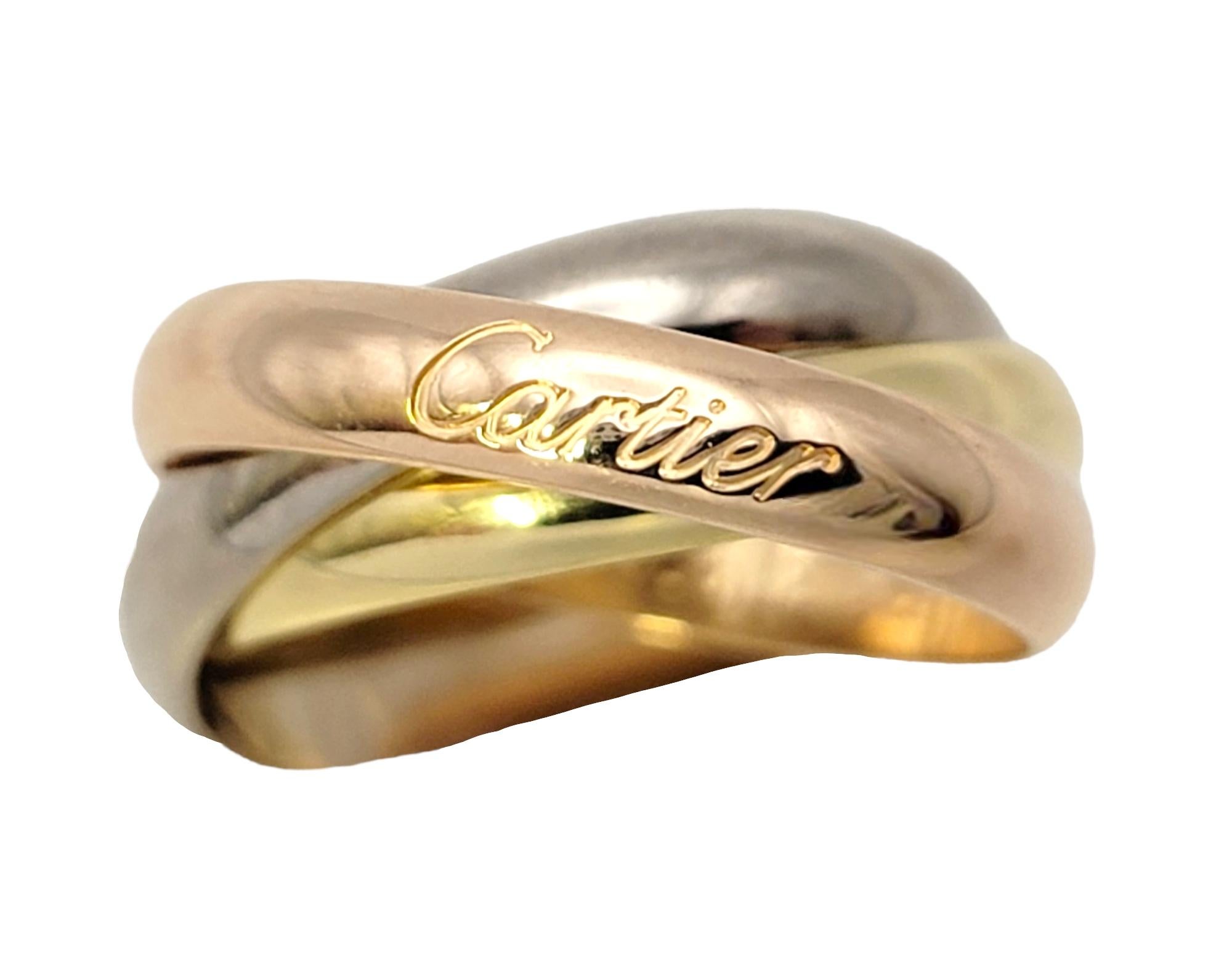 Ring size: 52 (US 6)

Sophisticated tri-color trinity band ring from Cartier is the perfect everyday piece. Cartier is a French high-end luxury goods company that designs, manufactures, distributes, and sells jewelry, leather goods, and watches. It