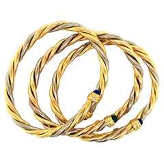 Cartier Tri-Color-Armreif aus Gold