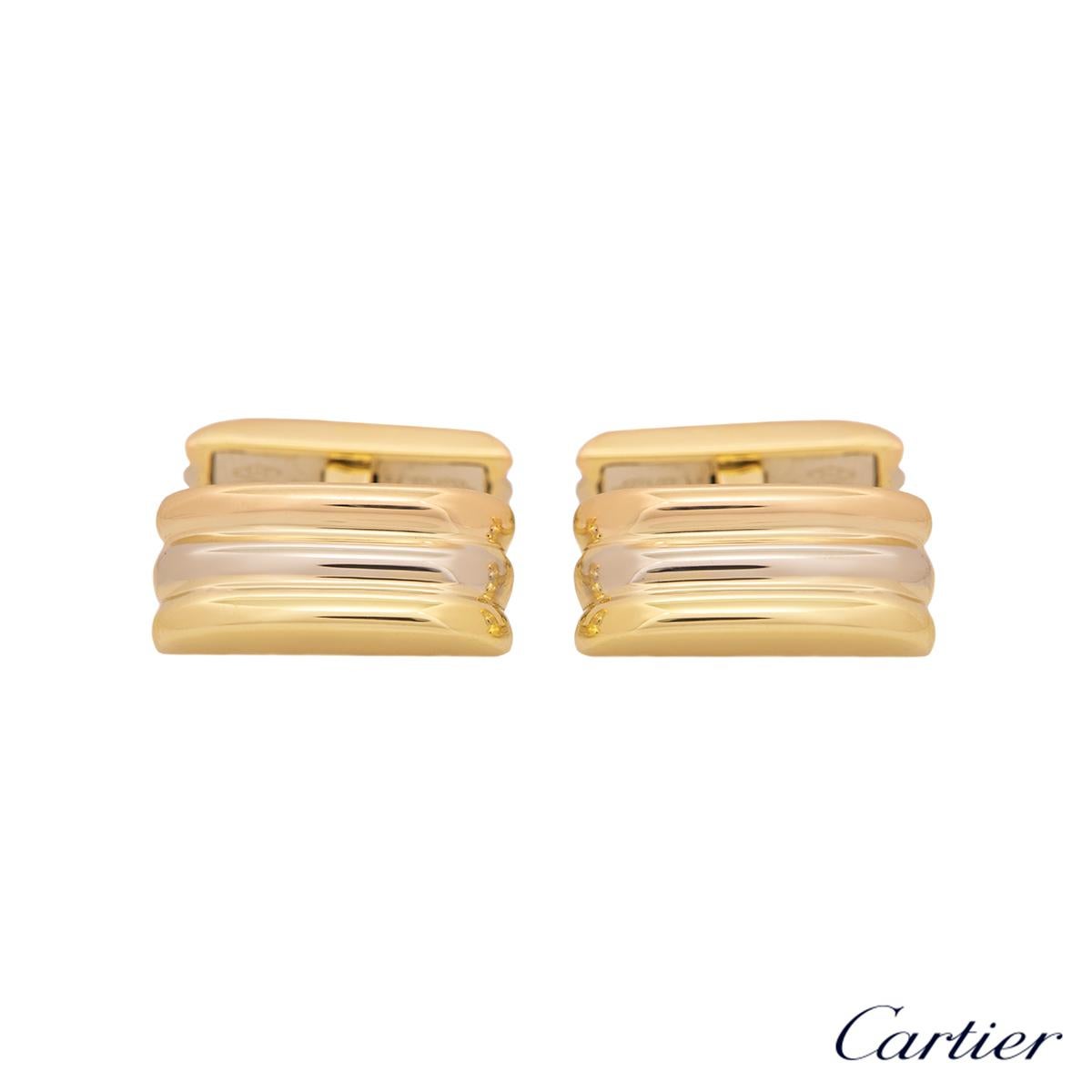 A stunning pair of 18k tri-colour gold cufflinks by Cartier from the Trinity De Cartier collection. The cufflinks are composed of a white, yellow and rose gold 3 bar row featuring a t-bar fitting. The cufflinks feature a length of 2.00cm and a