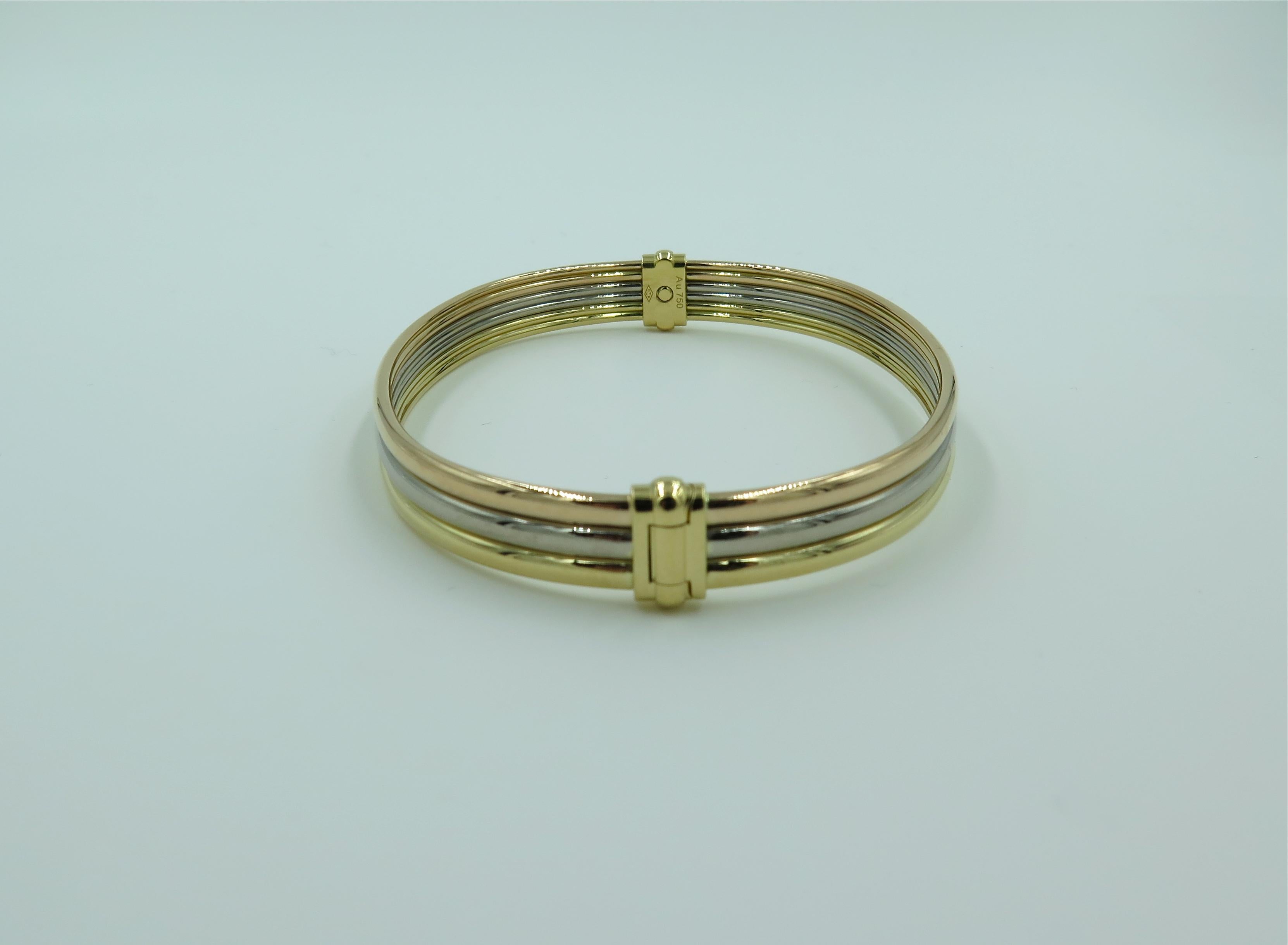 Cartier Tri Colored Gold Bangle Bracelet In Excellent Condition In New York, NY
