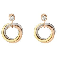 Cartier Orecchini con diamanti a trilogia in oro 0,11 carati B8301462
