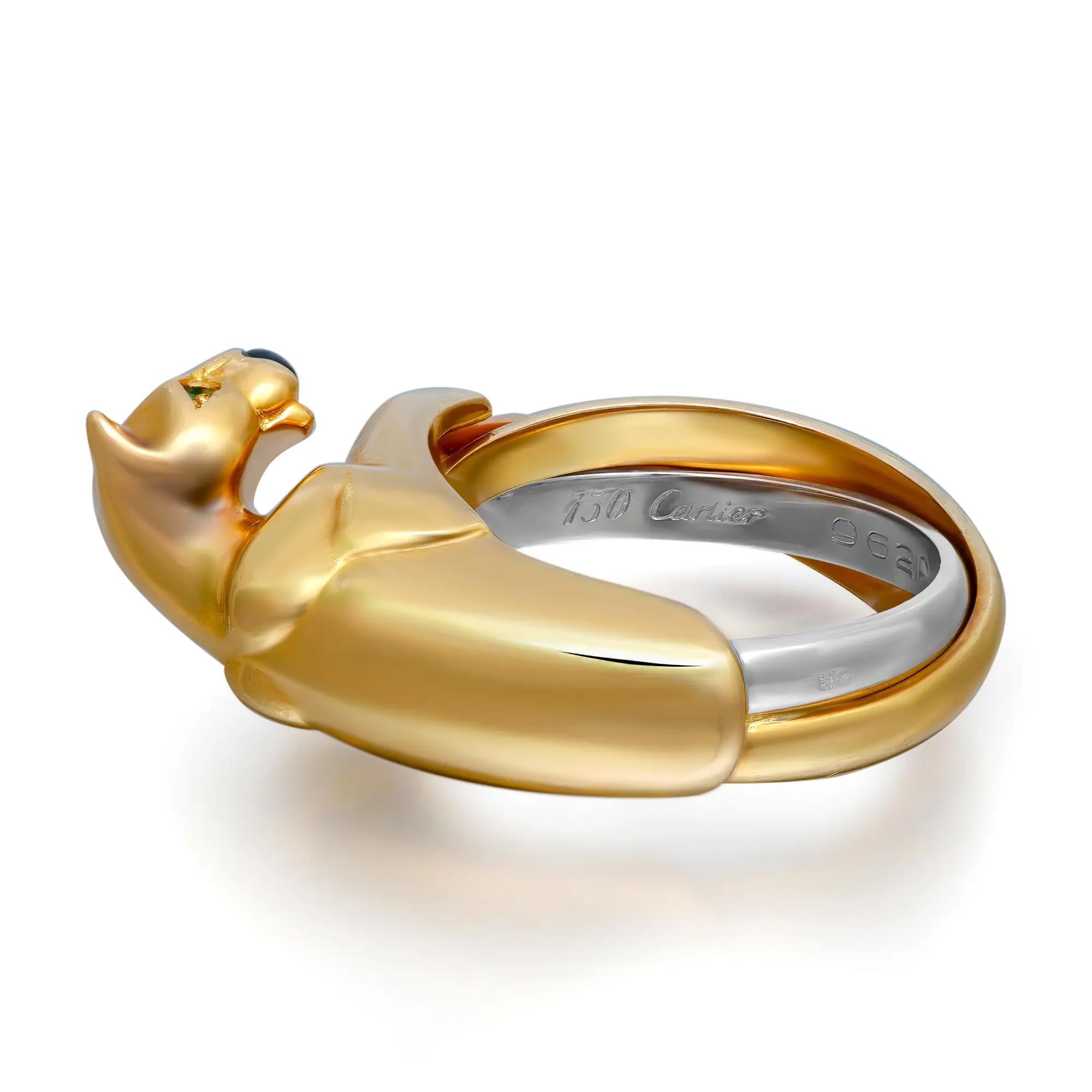 A beautiful 18k yellow gold ring by Cartier from the Panthere De Cartier collection. This ring is composed of one panthere motif complemented with two round emeralds set as the eyes and onyx for the nose with the body wrapping around to complete the