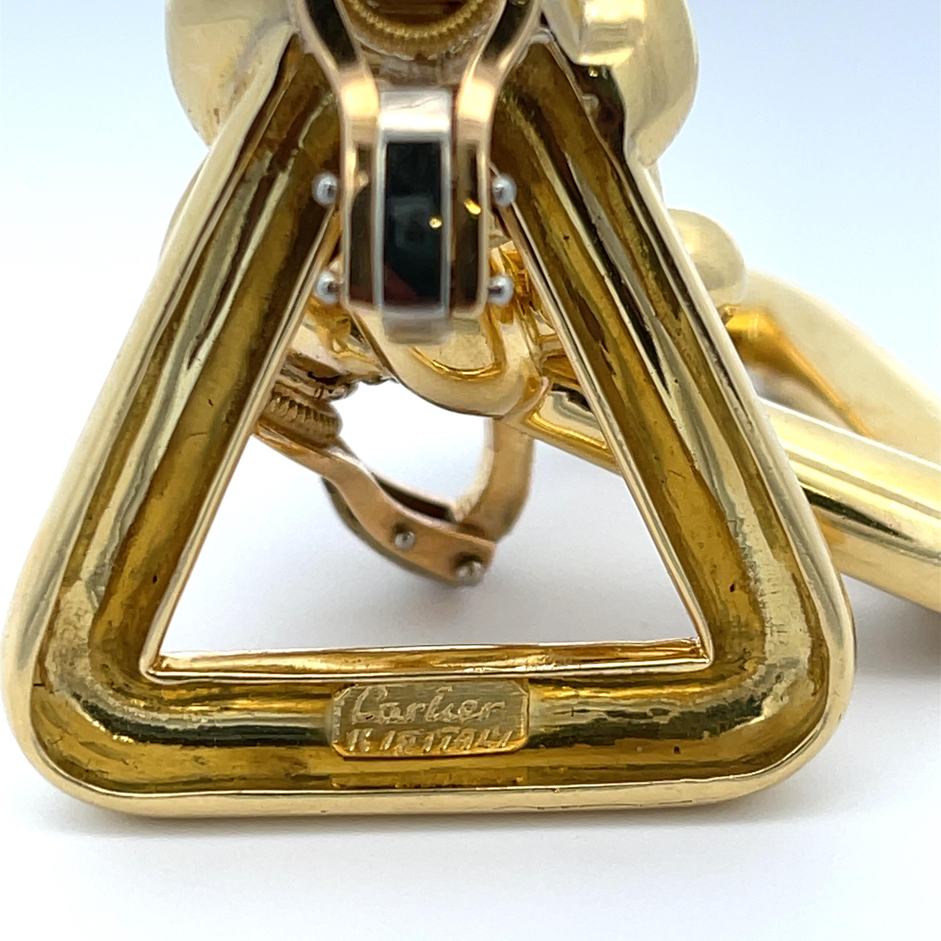 Estate Cartier Triangle Knot Earrings in 18K Yellow Gold. The earrings measure 1.5