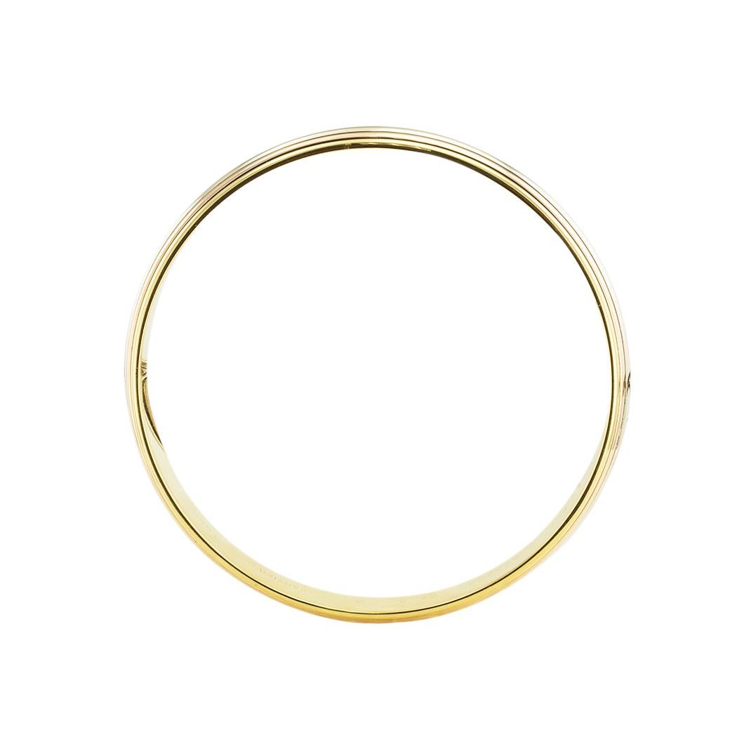 Contemporary Cartier Tricolor Gold Slip On Bangle Bracelet For Sale