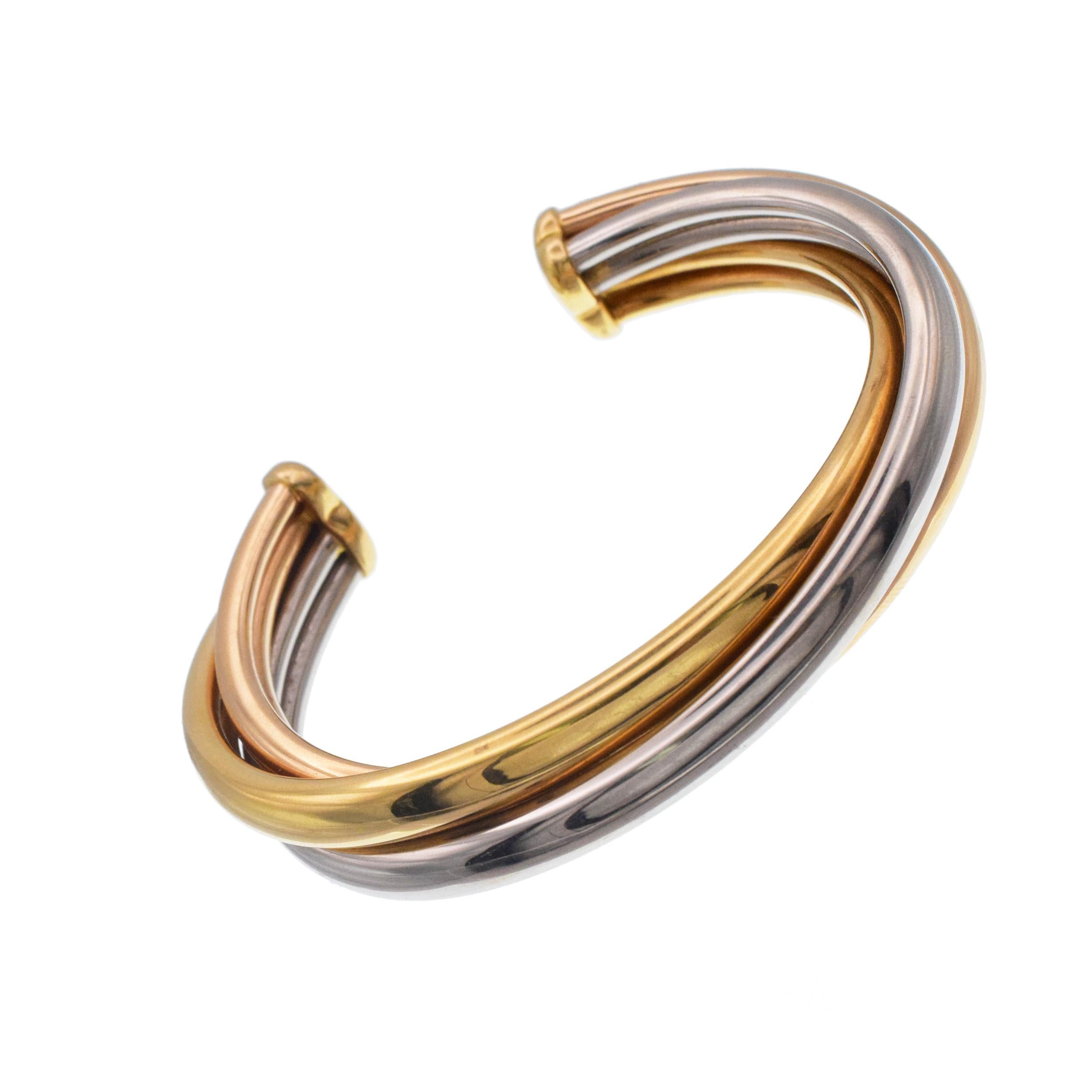 Cartier Tricolor Gold 'Trinity' Cuff Bangle Bracelet In Excellent Condition For Sale In New York, NY