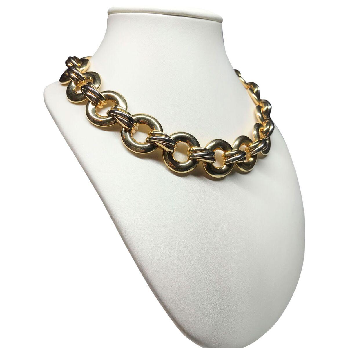 Cartier Trinity - this style epitomizes luxury and elegance and that's what this necklace is all about. Glorious 18k gold a very subtle 3 tone style. High polish yellow gold circles are connected with the trinity style 3 tone link that sits
