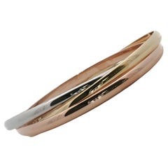 Cartier Trinity 18 Karat Tri-Color Gold Classic Style Bangle Bracelet