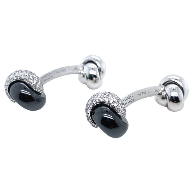 Cartier Boutons de manchette Trinity en or blanc 18 carats et diamants noués