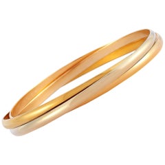 Cartier Trinity 18 Karat White, Yellow and Rose Gold Rolling Bangle Bracelet