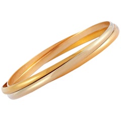 Cartier Trinity 18 Karat White, Yellow and Rose Gold Rolling Bangle Bracelet