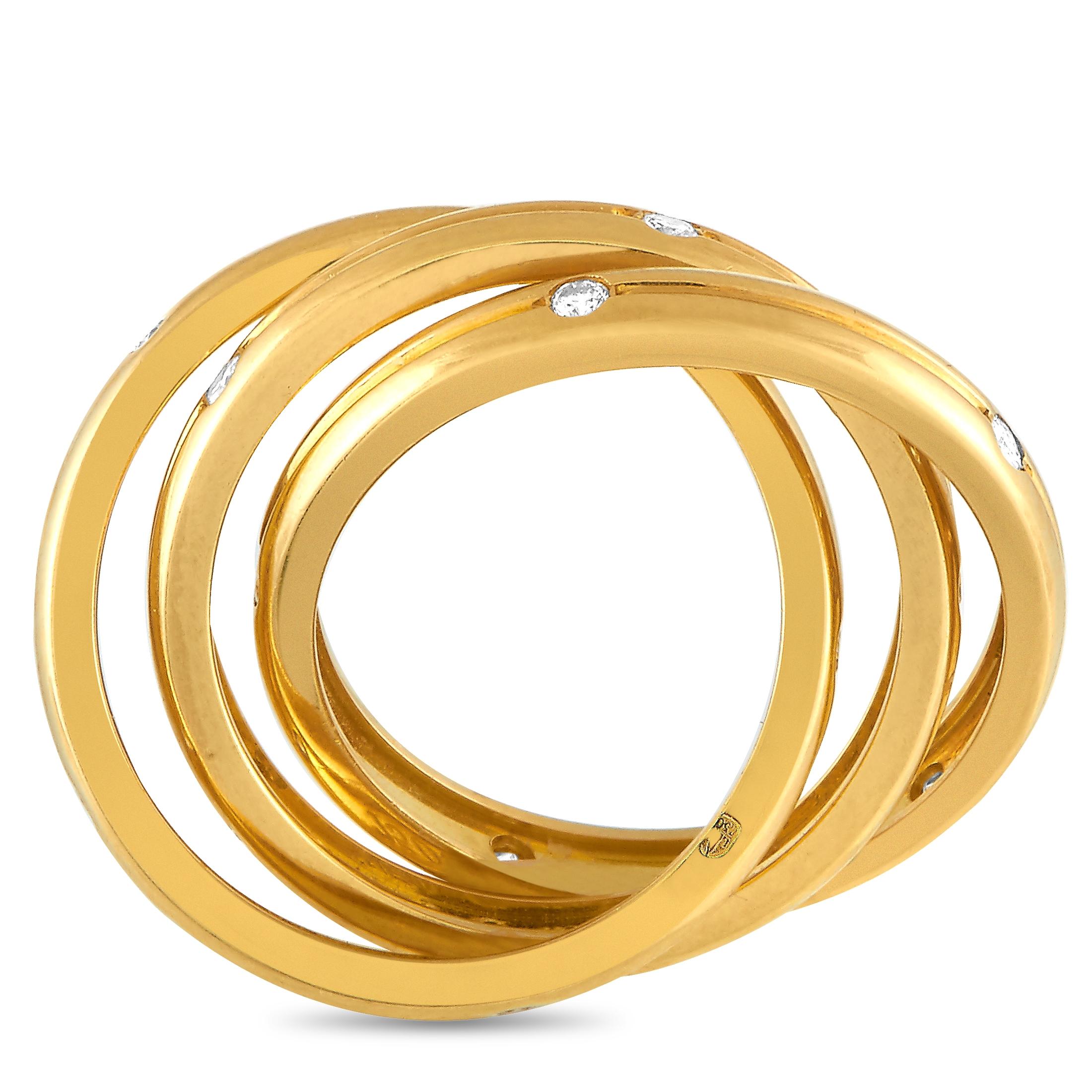 The Cartier “Trinity” ring is made of 18K yellow gold and embellished with diamonds. The ring weighs 9.6 grams and boasts band thickness of 7 mm and top height of 2 mm, while top dimensions measure 7 by 23 mm.
 
 This jewelry piece is offered in