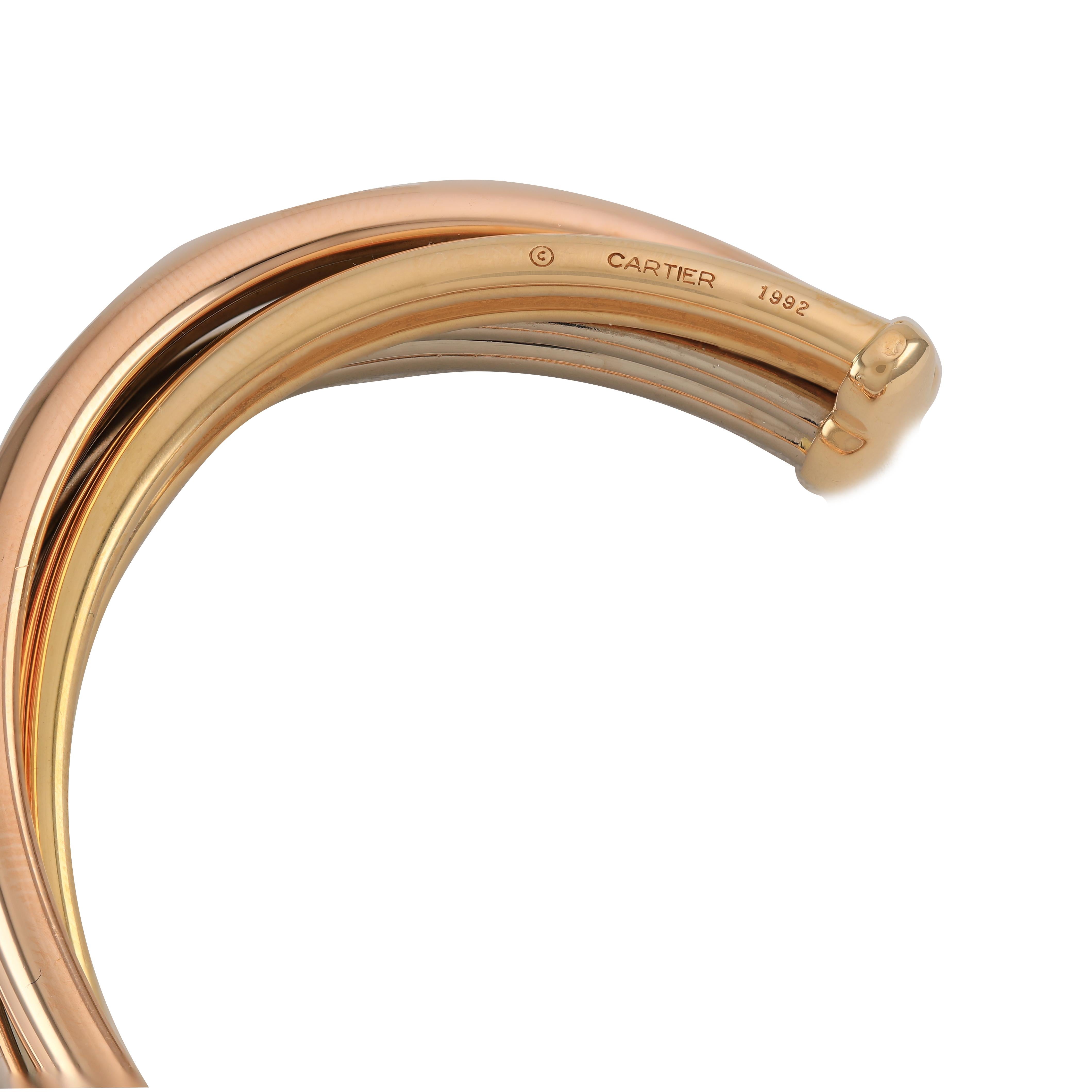 Contemporaneo Cartier Vintage Trinity Bracciale a tre bande in oro giallo, bianco e rosa 18 ct. in vendita