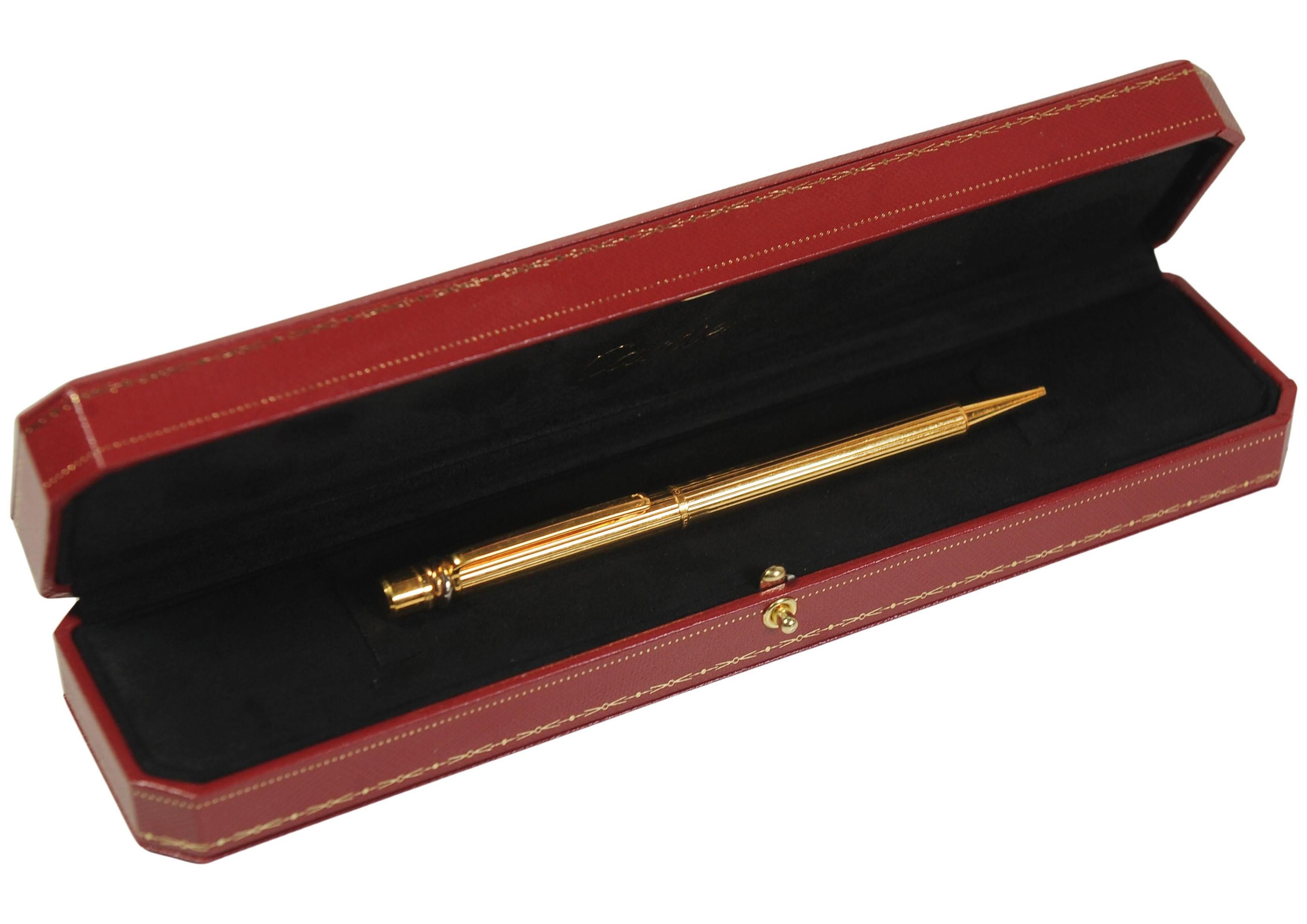 Cartier Trinity 18ct Gold Plated Ribbed Ballpoint Pen With A Red Cartier Box In Good Condition For Sale In Reading, Berkshire