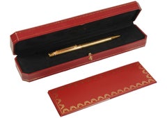 Cartier Trinity 18ct Gold Plated Ribbed Ballpoint Pen With A Red Cartier Box