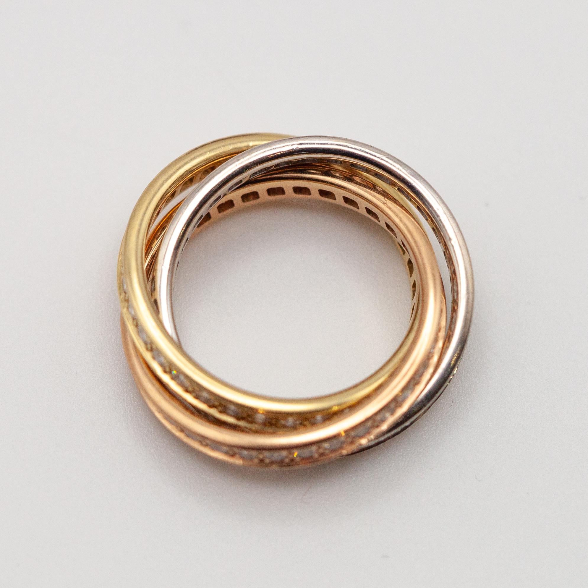 Cartier Trinity 18K Diamant-Rollring im Angebot 7