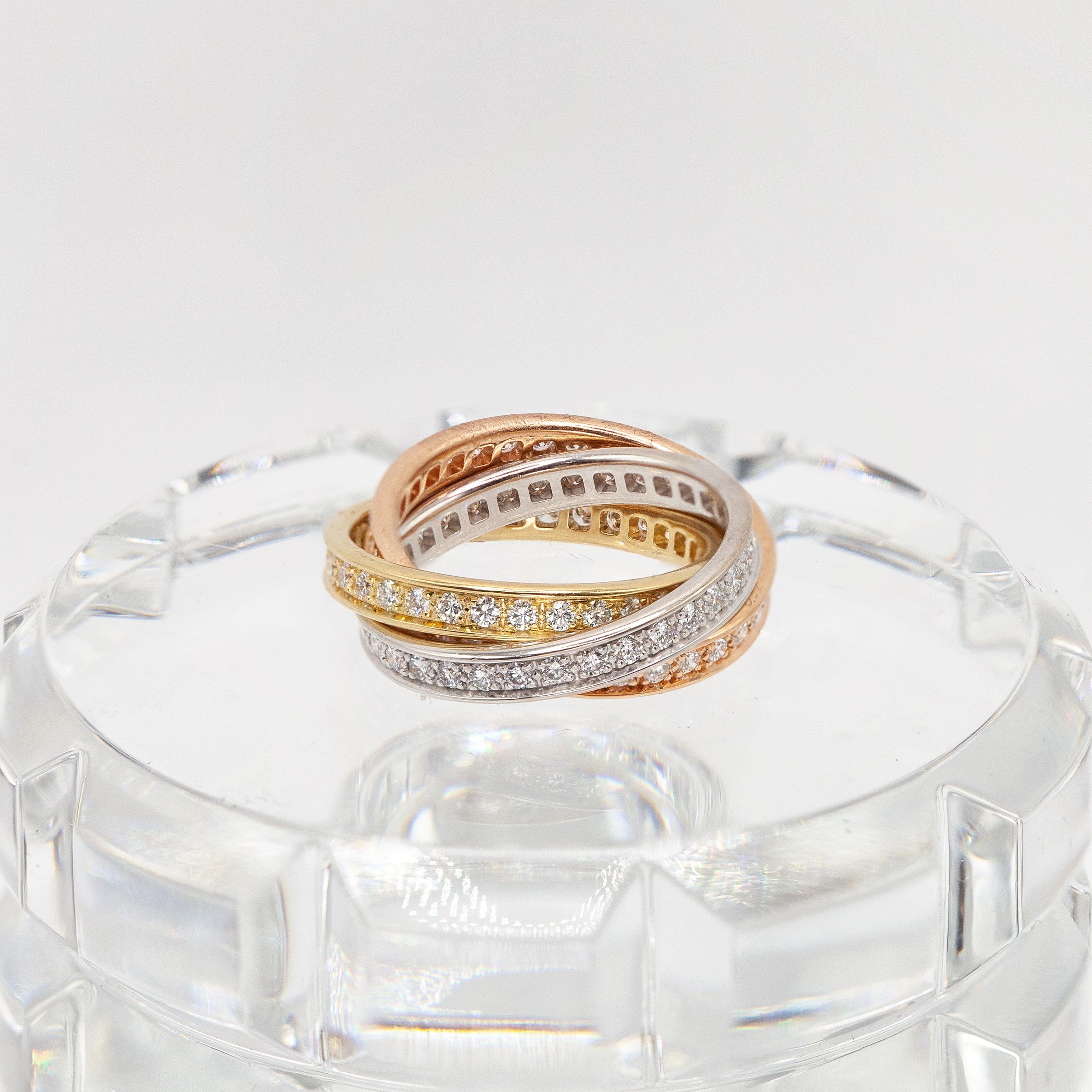 Modern Cartier Trinity 18K Diamond Rolling Ring For Sale
