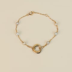 Cartier Trinity 18k Gold Perlenarmband