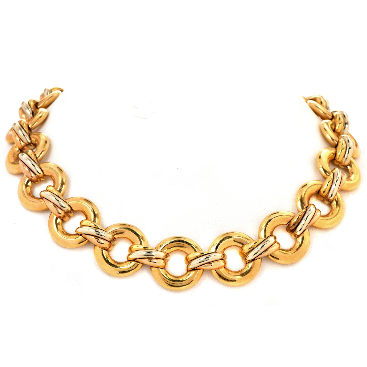 This Iconic Cartier Trinity 18k Multi Color Gold Circular Link choker Necklace In One of the most famous designs and it is made in yellow gold with a touch of white and pink gold Circa 1990s.

Cartier continues to be desired for its sophistication