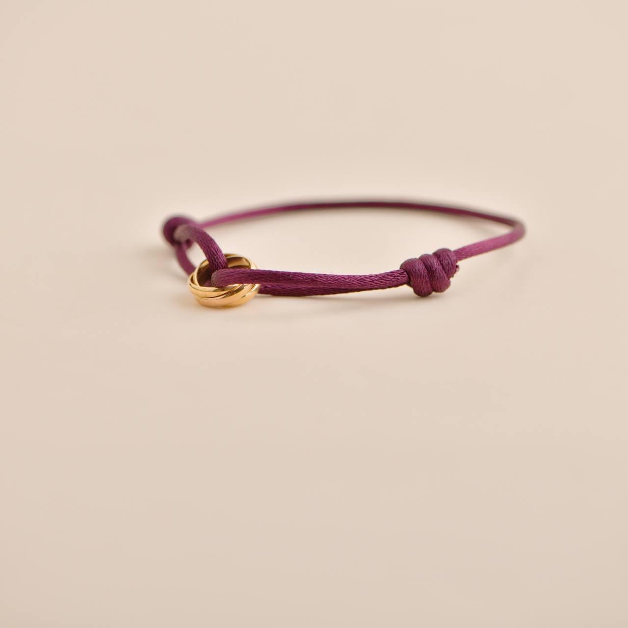 Cartier Trinity 18K Rose Gold Cord Adjustable Bracelet In Excellent Condition In Banbury, GB