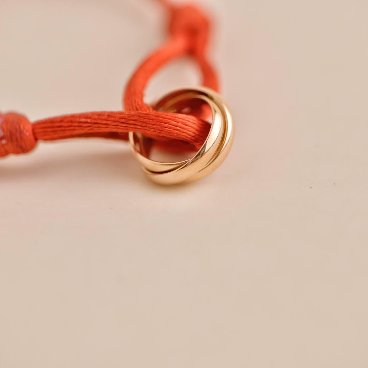Cartier Trinity 18K Roségold Rotes Kordelarmband im Zustand „Hervorragend“ in Banbury, GB