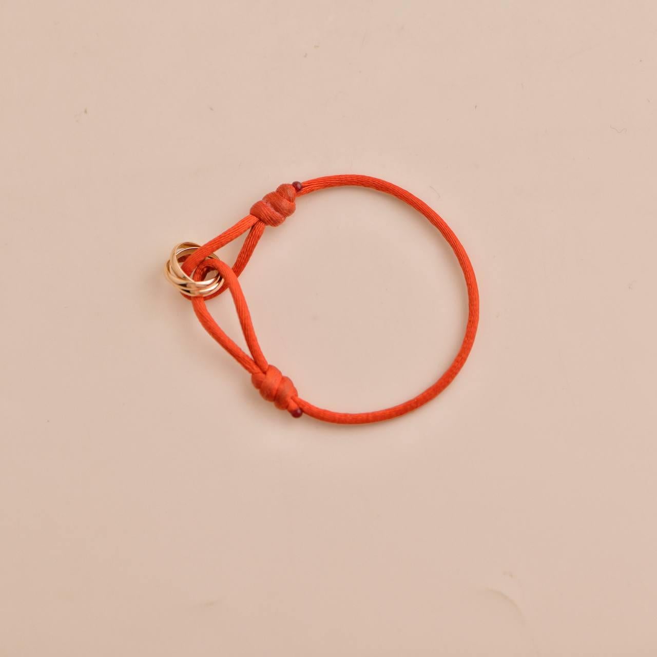 Women's or Men's Cartier Trinity 18K Rose Gold Red Cord Bracelet