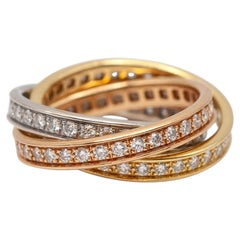 Bague Trinity Cartier en or tricolore 18 carats, sertie de diamants en pavé