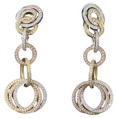 Orecchini a fascia con diamanti Cartier Trinity in oro tricolore 18k