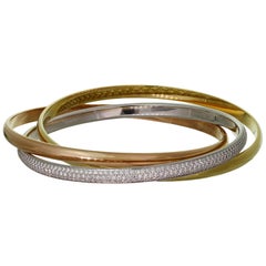 Cartier Trinity Armband aus 18-karätigem Tri-Gold mit Diamanten, mittleres Modell