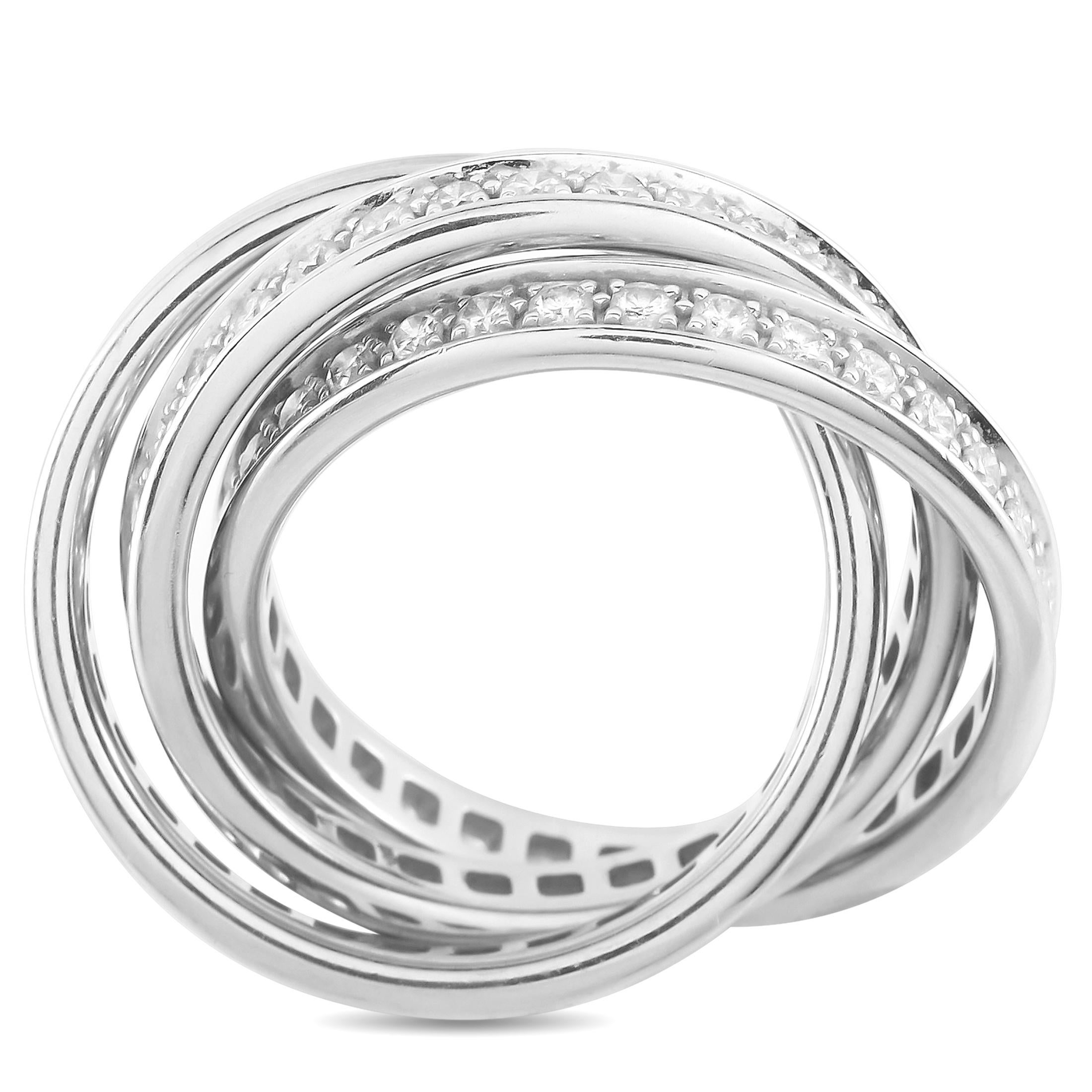 A trio of interlocking 18K White Gold bands provide this Cartier Trinity ring with texture, dimension, and movement. Each band is also accented by a series of sparkling inset Diamonds, making this a luxury piece that will continually make a subtle