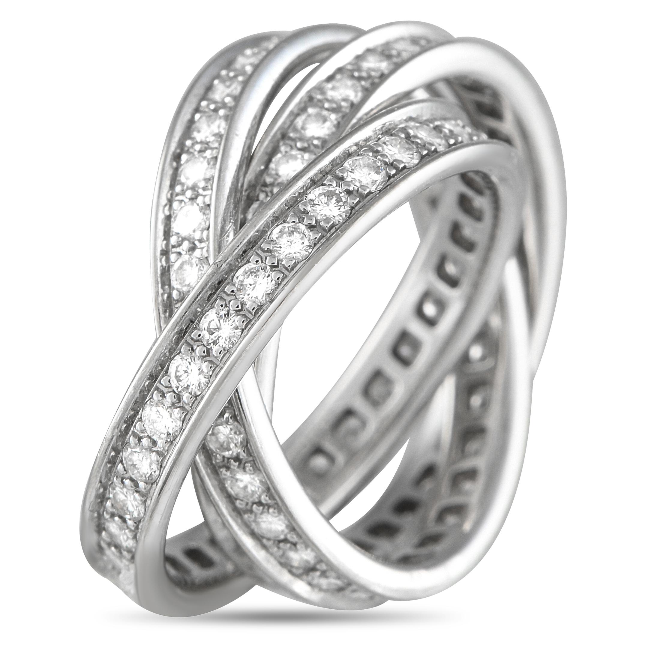Despite its simplicity, this 18K White Gold Cartier Trinity ring is unforgettable. It features a trio of interlaced bands meant to symbolize love, fidelity, and friendship  the cornerstones of any relationship. Inset Diamonds throughout the design