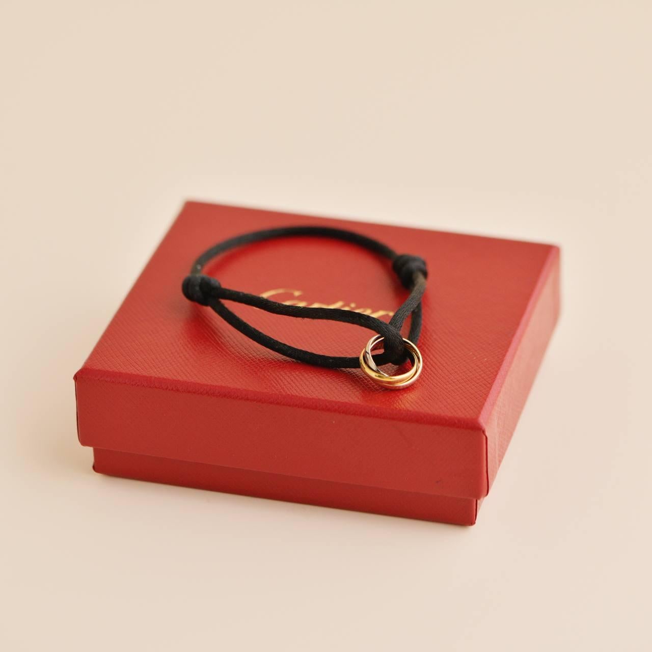 Cartier Trinity 18k White Yellow Rose Gold Black Cord Bracelet In Excellent Condition In Banbury, GB