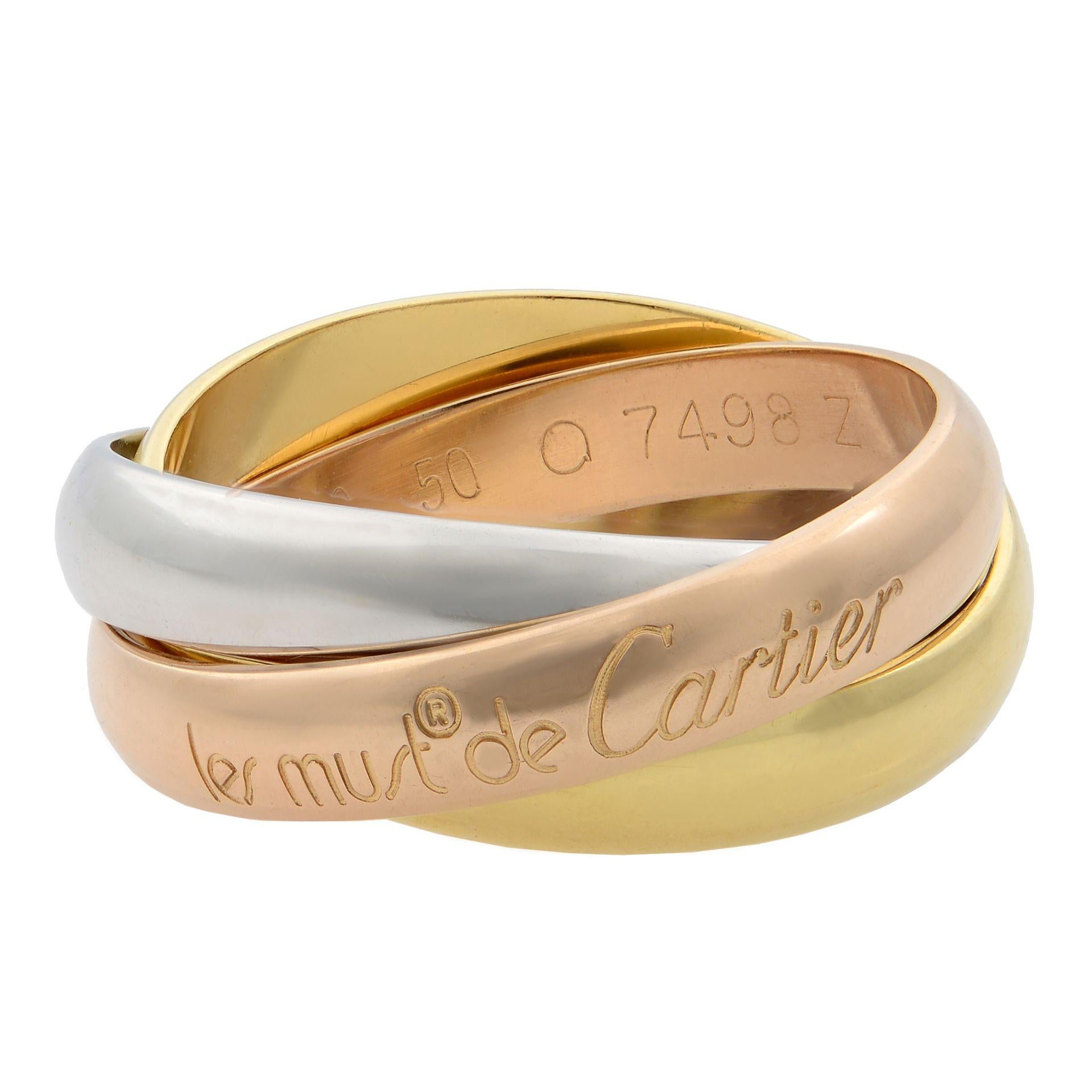 Cartier Trinity classic ring. The ring is crafted in 18K white gold, yellow gold and rose gold. Width: 3.5 mm. Ring size 50, US 5. Pre-owned, looks great. Comes with certificate, box not included. 