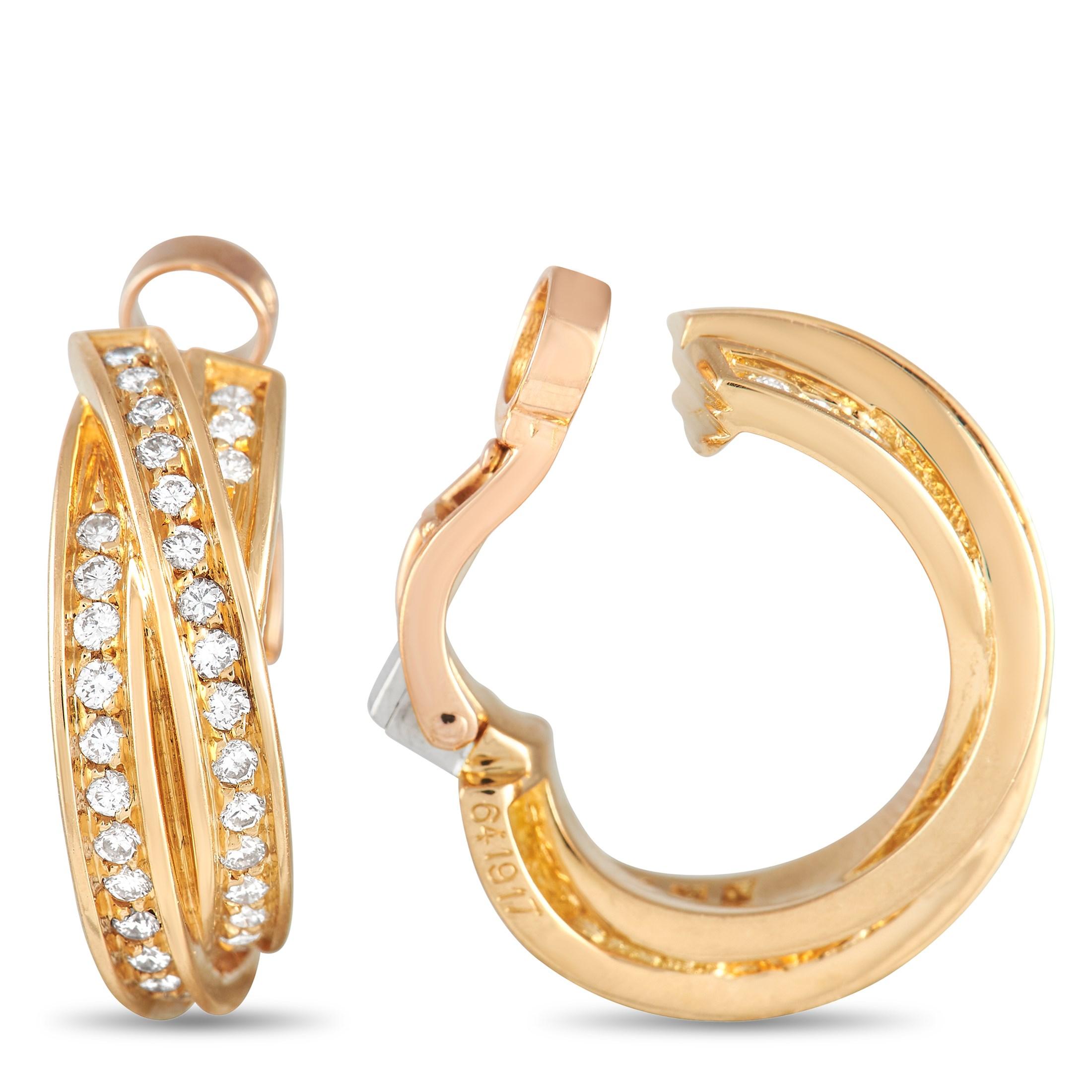 These Cartier Trinity earrings possess a sense of refinement that will never go out of style. Each earring features a trio of interwoven bands made from lustrous 18K Yellow Gold. At their centers, sparkling inset diamonds sparkle and shine. These