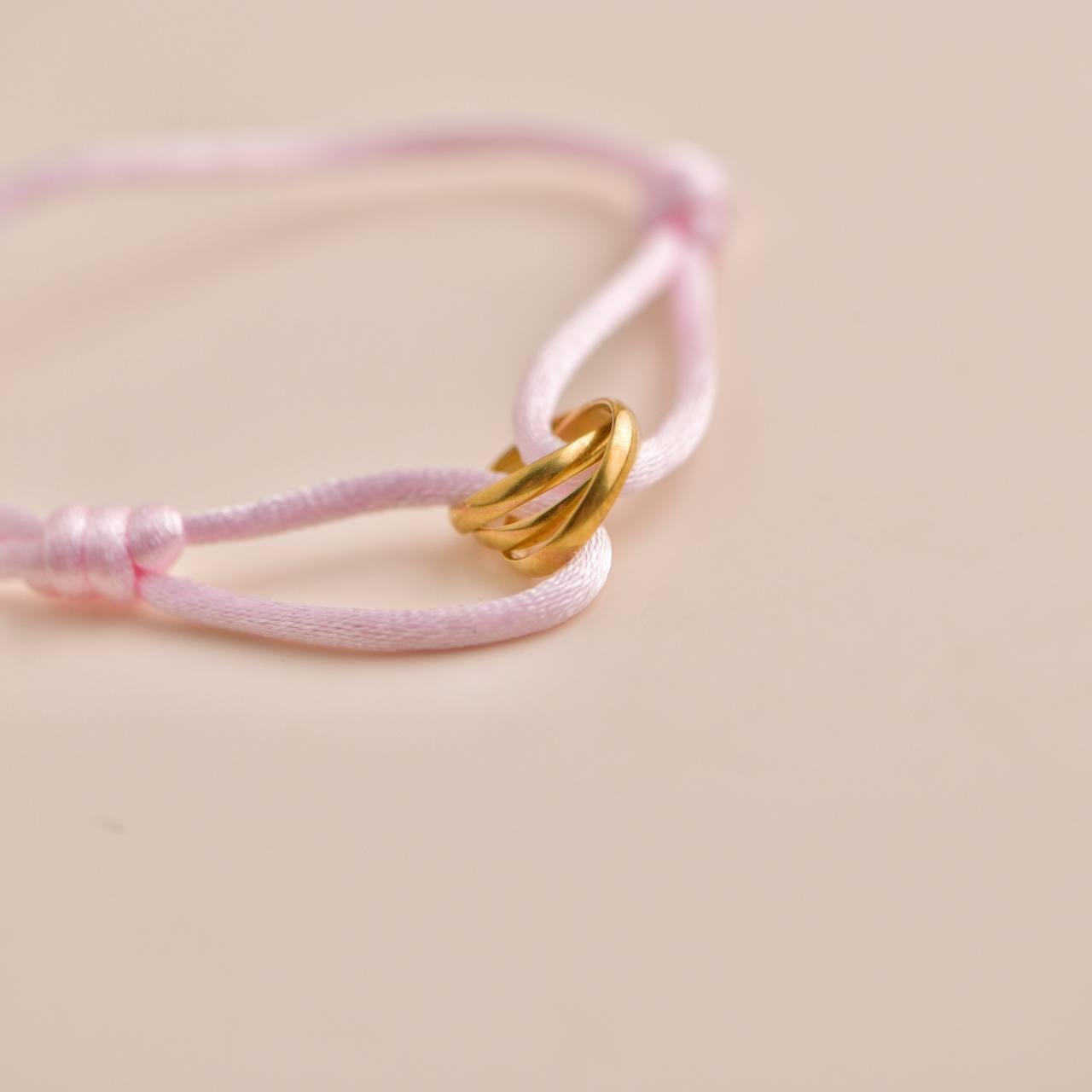 Women's or Men's Cartier Trinity 18K Yellow Gold Pink Silk Cord Bracelet