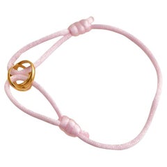Cartier Trinity 18K Yellow Gold Pink Silk Cord Bracelet